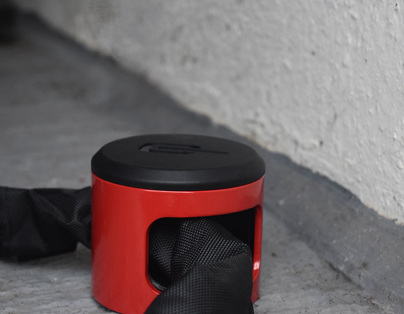 Chain lock attached to floor anchor