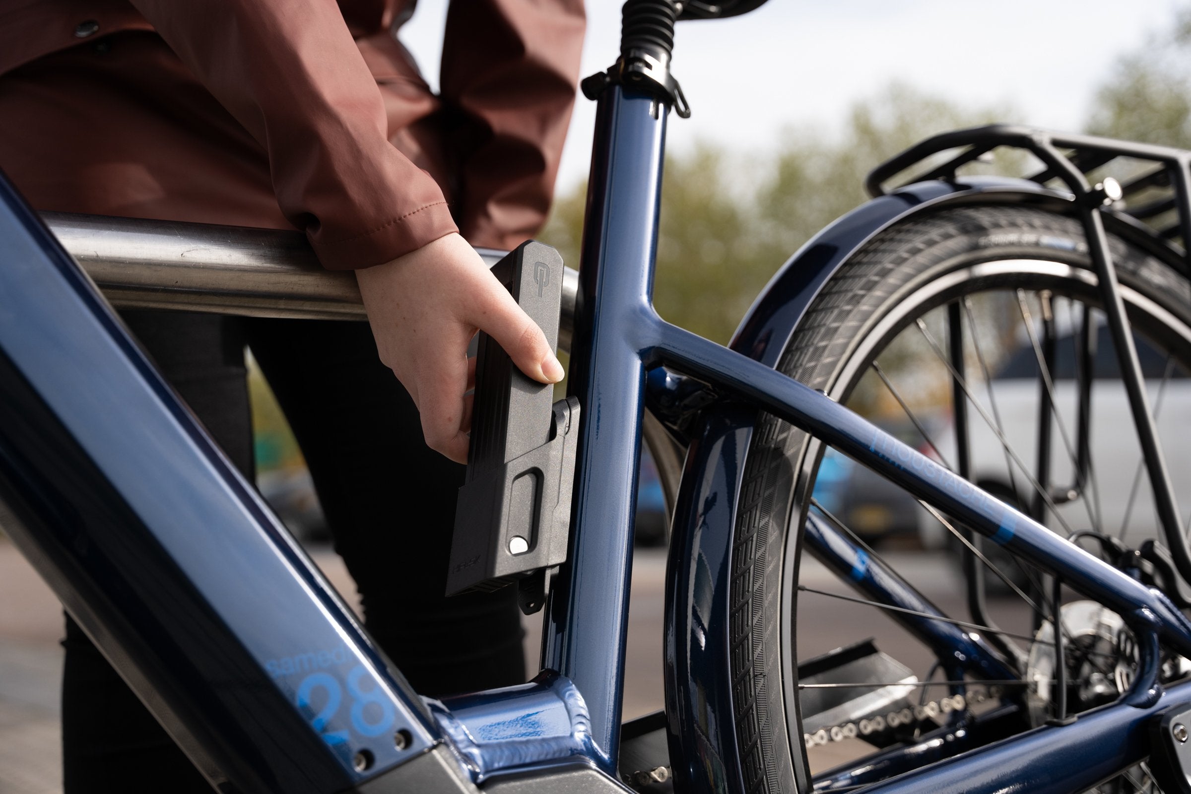 SWITCH All Black loaded into bottle cage on ebike