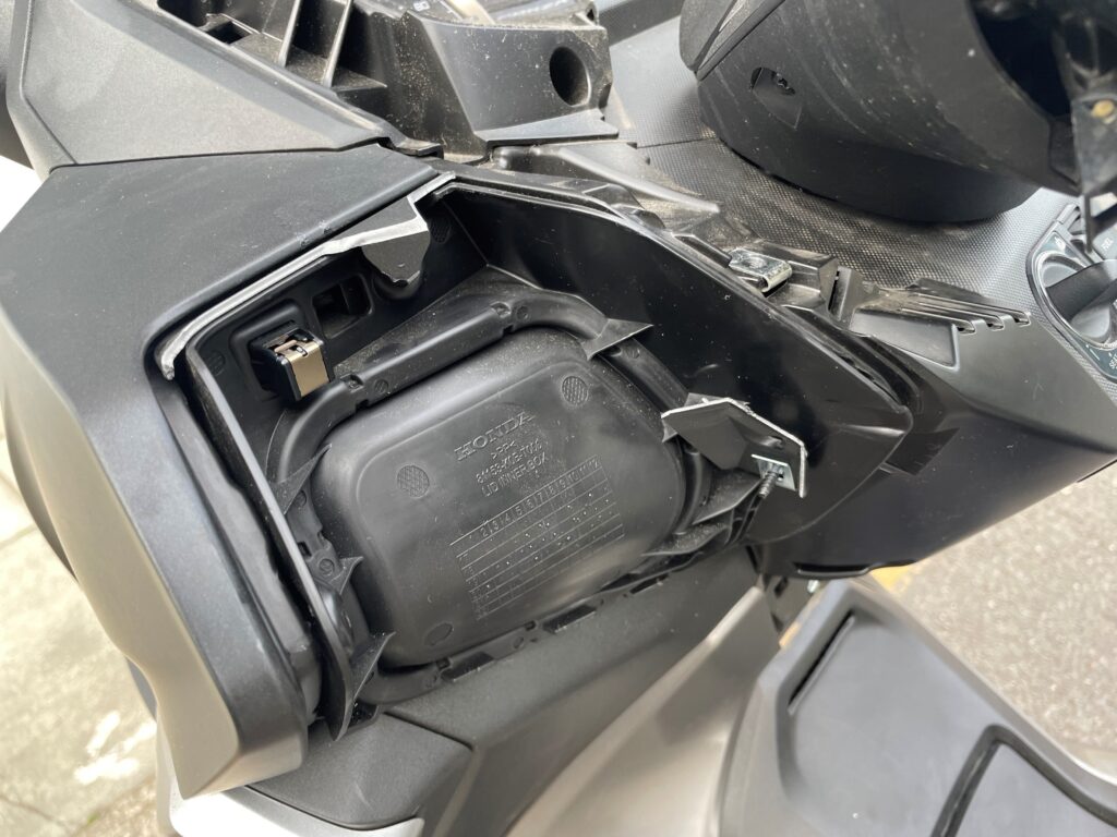 Damage to the Honda Motorcycle Faring sustained to gain access to the electronics. 